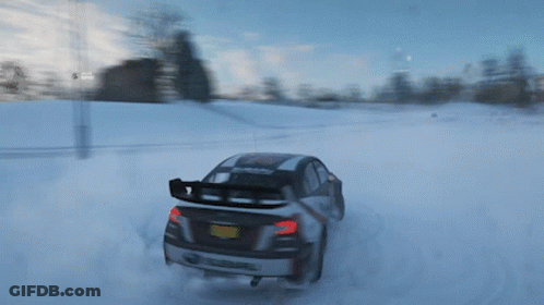 A Subaru Car Driving Through The Snow With A New York License Plate GIF