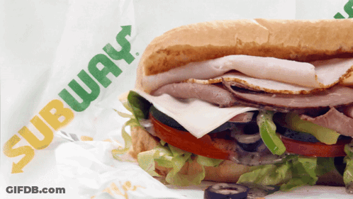 A Subway Sandwich Is Wrapped In A Paper GIF