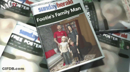 A Sunday Herald Newspaper With A Picture Of A Family On The Cover GIF