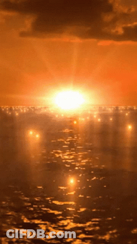 A Sunset Over A Body Of Water With A Watermark On The Bottom GIF