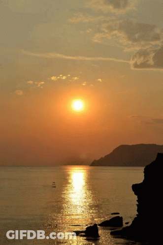 A Sunset Over A Body Of Water With The Word Carla On The Bottom Right GIF