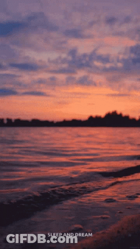 A Sunset Over A Body Of Water With The Words Sleep And Dream GIF