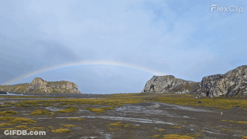 A Sunset Over A Snowy Landscape With The Word Flexclip In The Corner GIF