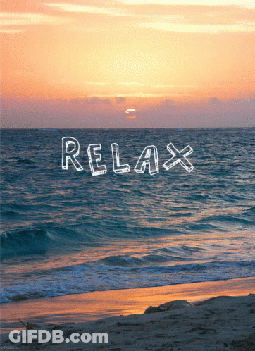 A Sunset Over The Ocean With The Word Relax Written In The Water GIF