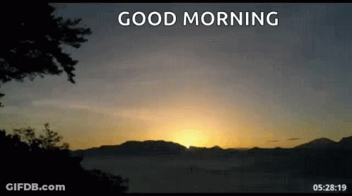 A Sunset With The Words `` Good Morning '' Written In The Sky GIF