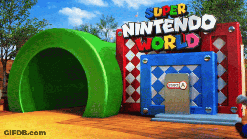 A Super Nintendo World Sign With A Green Tunnel GIF