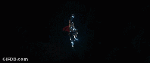 A Superhero With A Red Cape And A Lightning Bolt GIF