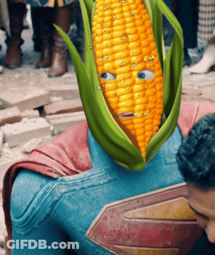 A Superman With A Corn On The Cob On His Face GIF