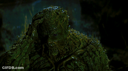 A Swamp Monster With A Beard And A Bearded Face GIF