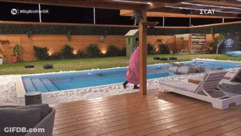 A Swimming Pool With A Sign That Says #Big Brother Gr GIF