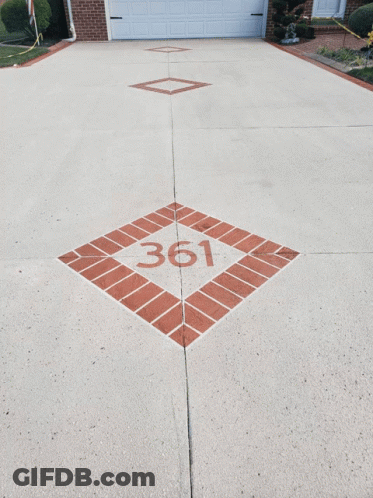 A Swimming Pool With A Slide And A Concrete Patio GIF