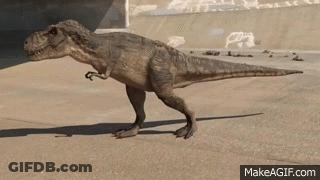 A T-Rex Dinosaur Is Walking On A Concrete Surface . GIF