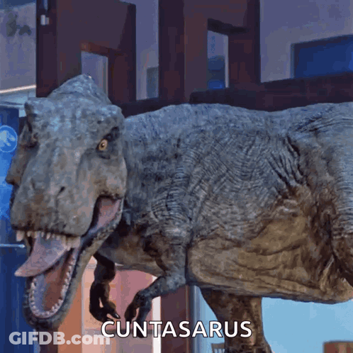 A T-Rex With Its Tongue Hanging Out And The Word Cuntasarus Written Below It GIF