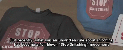 A T-Shirt With A Stop Sign On It Sits On A Table GIF