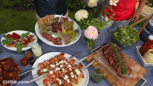 A Table Topped With Plates Of Food And A Popsugar Logo On The Bottom GIF