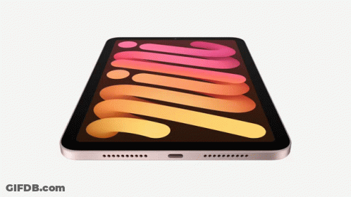 A Tablet With A Rainbow Colored Screen Has A Swirl Pattern On It GIF