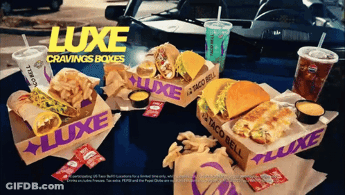 A Taco Bell Advertisement Shows A Luxe Cravings Box GIF