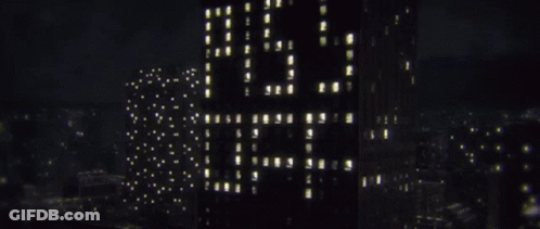 A Tall Building With The Word Lg On It GIF