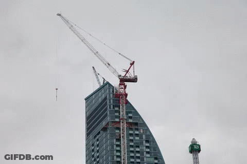 A Td Bank Tower Is Being Built Next To A Very Tall Building GIF