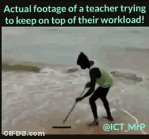 A Teacher Is Trying To Keep On Top Of His Workload GIF