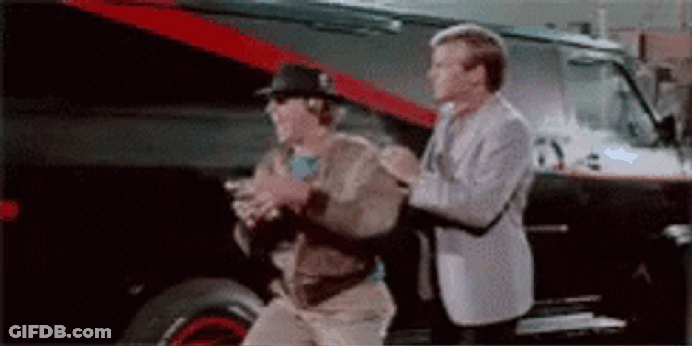 A Team Approaching The Truck GIF