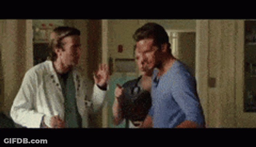 A Team Doctors Noticing The Stitches GIF
