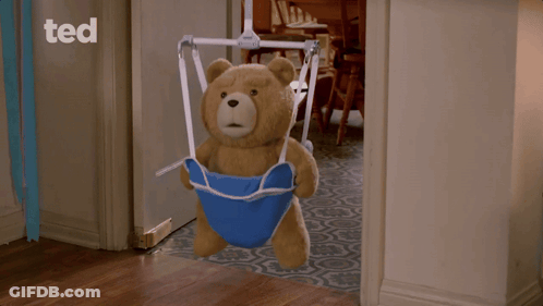 A Teddy Bear In A Blue Swing With The Word Ted On The Bottom Right GIF