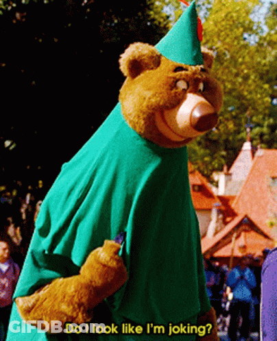 A Teddy Bear In A Green Outfit Says Do I Look Like I M Joking GIF