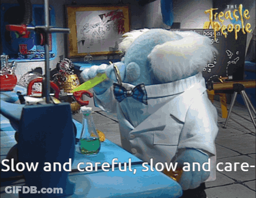 A Teddy Bear In A Lab Coat With The Words Slow And Careful GIF