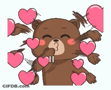 A Teddy Bear Is Blowing A Kiss With Hearts Around Him . GIF