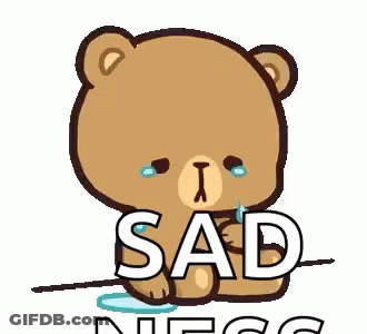 A Teddy Bear Is Crying With Tears Coming Out Of His Eyes And The Word Sad Is On A White Background . GIF