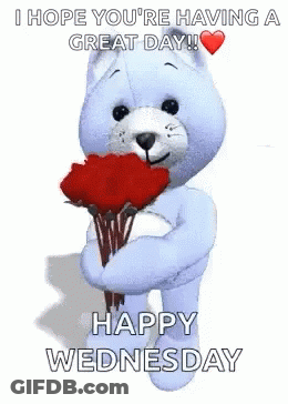 A Teddy Bear Is Holding A Bouquet Of Red Roses And Says Happy Wednesday . GIF