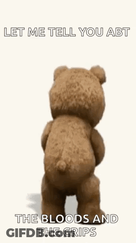 A Teddy Bear Is Holding A Cocktail Shaker And A Bottle Of Alcohol . GIF