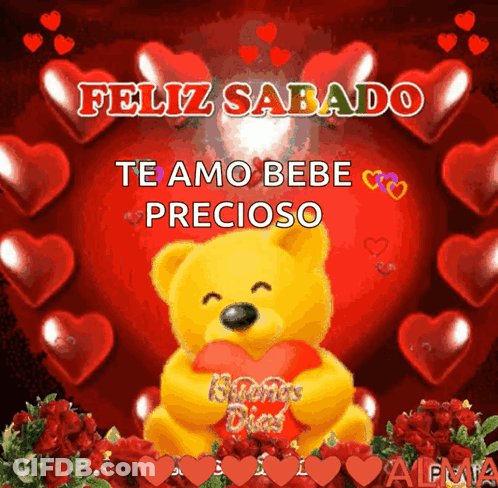 A Teddy Bear Is Holding A Heart With The Words Feliz Sabado Te Amo Bebe Precioso GIF