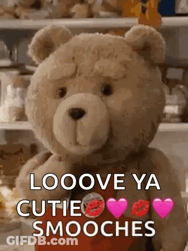 A Teddy Bear Is Holding A Red Heart And Says Looove Ya Cutie Smooches . GIF