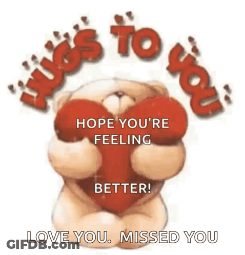 A Teddy Bear Is Holding A Red Heart With The Words Hugs To You Hope You 'Re Feeling Better Love You Missed You GIF