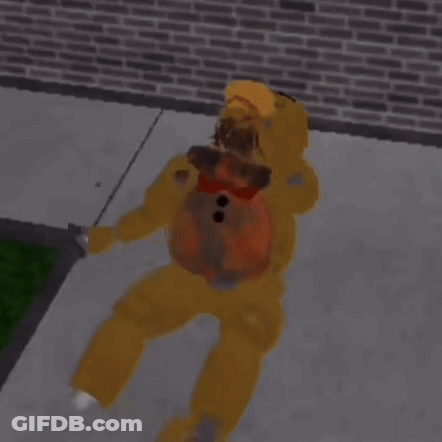 A Teddy Bear Is Laying On The Sidewalk With A Brick Wall In The Background . GIF