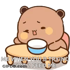 A Teddy Bear Is Sitting At A Table With A Bowl Of Food And Says `` Me When You B Trying Not 2 Feed Me '' GIF