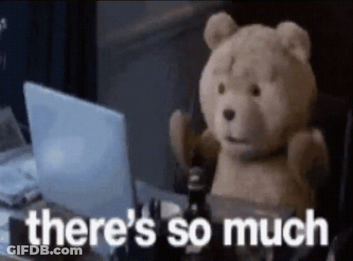 A Teddy Bear Is Sitting In Front Of A Laptop With The Words There 'S So Much Written On It GIF