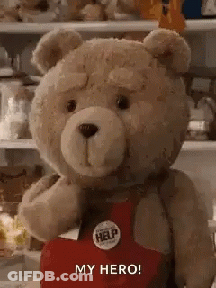 A Teddy Bear Is Wearing A Red Apron And Holding A Help Button . GIF