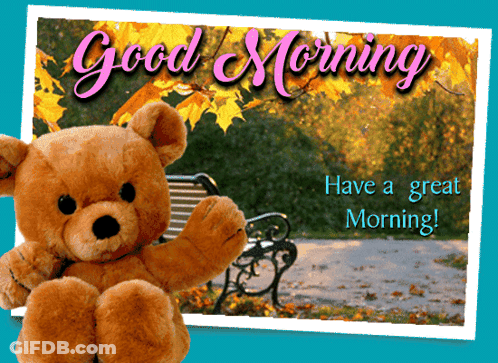 A Teddy Bear Sits On A Park Bench With A Good Morning Message GIF