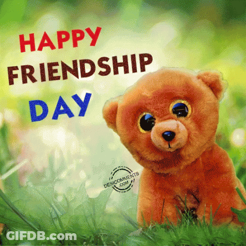 A Teddy Bear Sitting In The Grass With The Words Happy Friendship Day GIF