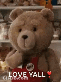 A Teddy Bear Wearing A Red Apron Is Standing In Front Of A Shelf And Says `` Love Yall '' . GIF