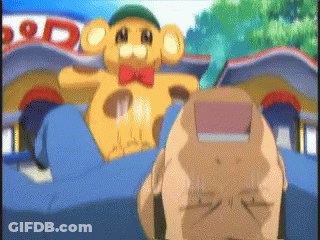 A Teddy Bear With A Red Bow Tie Is Sitting In Front Of A Building That Says ' Dod ' On It GIF