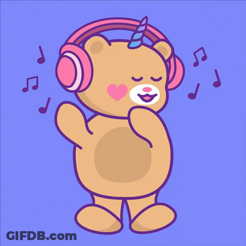 A Teddy Bear With A Unicorn Horn Wearing Headphones GIF