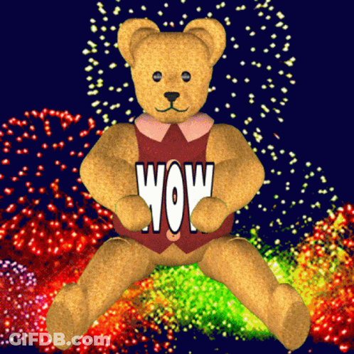 A Teddy Bear With The Word Wow On Its Chest GIF