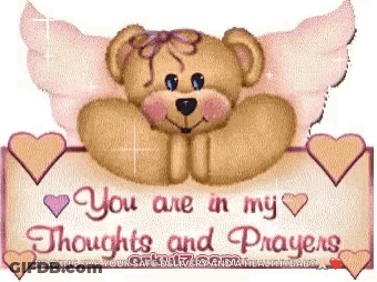 A Teddy Bear With Wings Is Holding A Sign That Says `` You Are In My Thoughts And Prayers '' . GIF