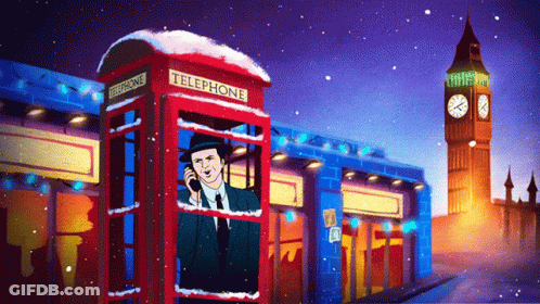 A Telephone Booth With A Man Talking On A Phone GIF