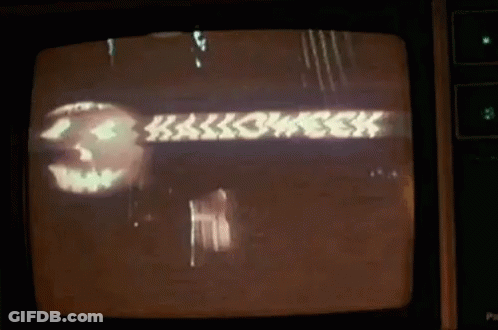 A Television Screen Shows A Pumpkin And The Words Halloween GIF