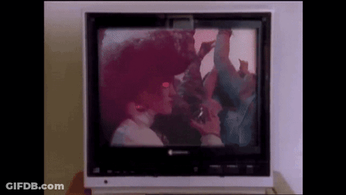 A Television With A Picture Of A Man And Woman On It GIF